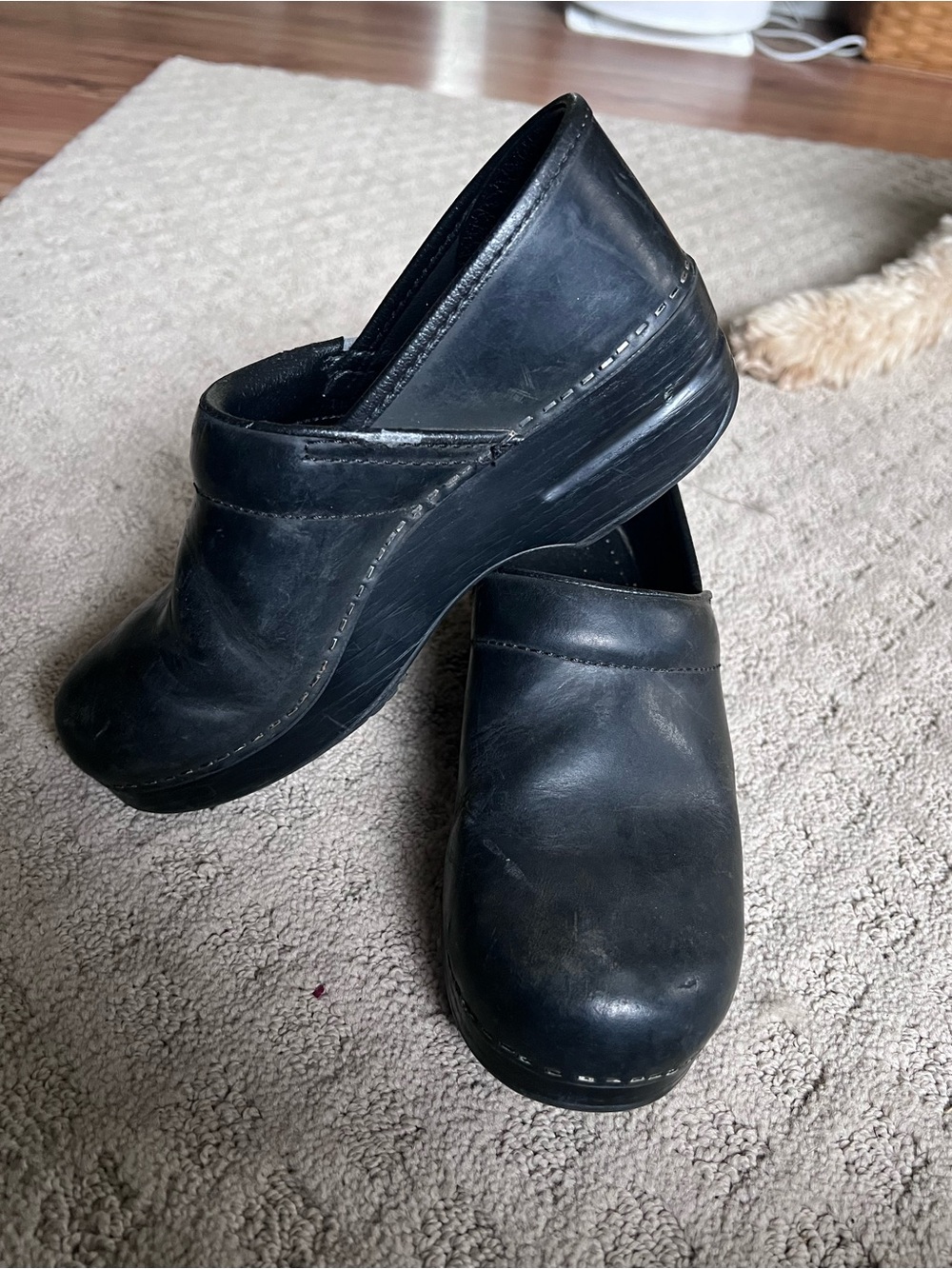 Dansko Black Leather Slip-On Clogs